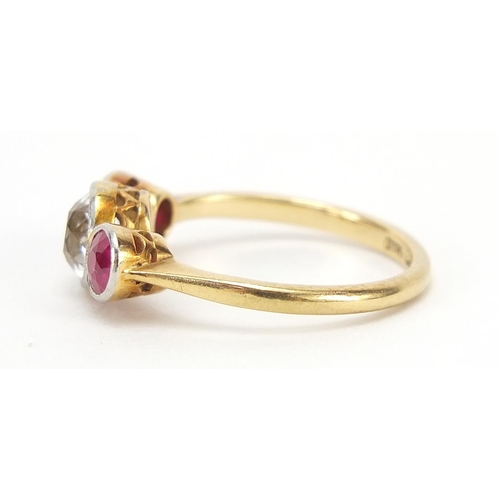 105 - 18ct gold and platinum ruby and clear stone ring, tests as diamond or white sapphire, size L, 2.9g