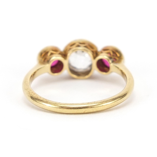 105 - 18ct gold and platinum ruby and clear stone ring, tests as diamond or white sapphire, size L, 2.9g