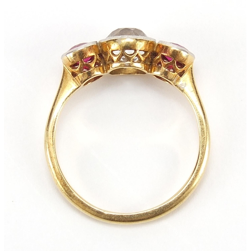 105 - 18ct gold and platinum ruby and clear stone ring, tests as diamond or white sapphire, size L, 2.9g