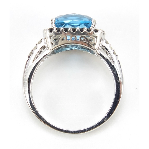 199 - 9ct white gold blue topaz, sapphire and diamond ring, size O/P, 4.7g