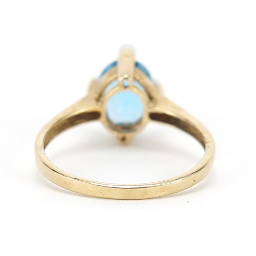 282 - 9ct gold blue topaz and diamond ring, size P/Q, 2.8g