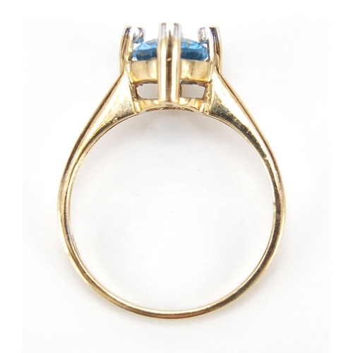 282 - 9ct gold blue topaz and diamond ring, size P/Q, 2.8g