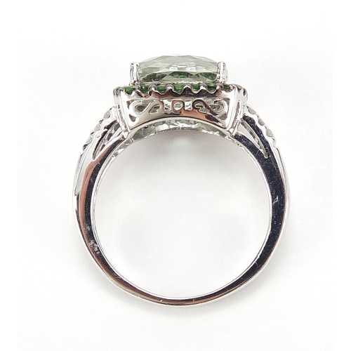 284 - 9ct white gold aquamarine and green stone ring, with diamond shoulders, size N/O, 4.6g