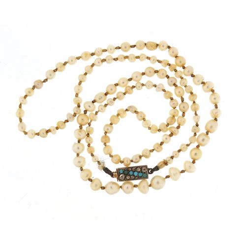 111 - Antique graduated pearl necklace with 9ct gold, diamond and turquoise clasp, housed in a tooled leat... 