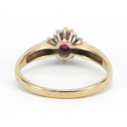 359 - 9ct gold ruby and diamond cluster ring, size R, 2.7g