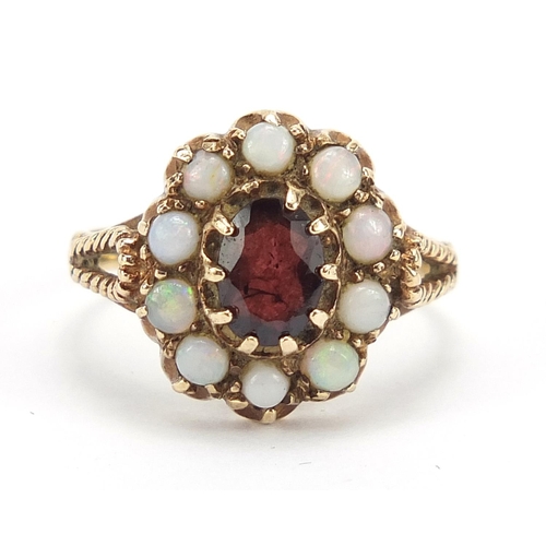 395 - Antique design 9ct gold garnet and opal ring, size L/M, 3.2g