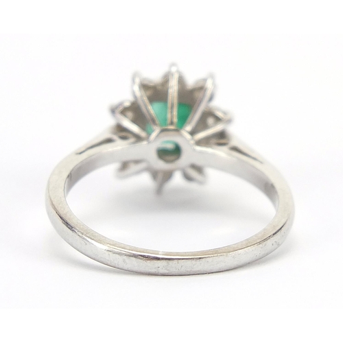 299 - 18ct white gold emerald and diamond ring, each diamond approximately 2.0mm in diameter, size K, 3.0g