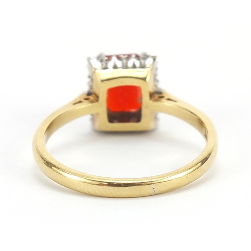 215 - 18ct gold red stone and diamond ring, size M, 3.1g