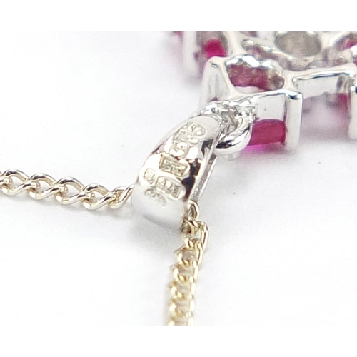 207 - 9ct white gold diamond and ruby pendant on a 9ct white gold necklace housed in a Lynley's box, 1.5cm... 