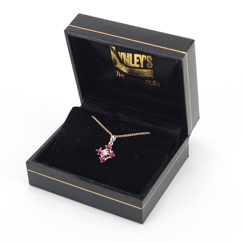 207 - 9ct white gold diamond and ruby pendant on a 9ct white gold necklace housed in a Lynley's box, 1.5cm... 