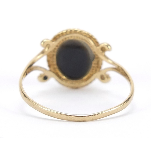 167 - Antique design 9ct gold cabochon stone ring with scrolled shoulders, size R, 1.5g