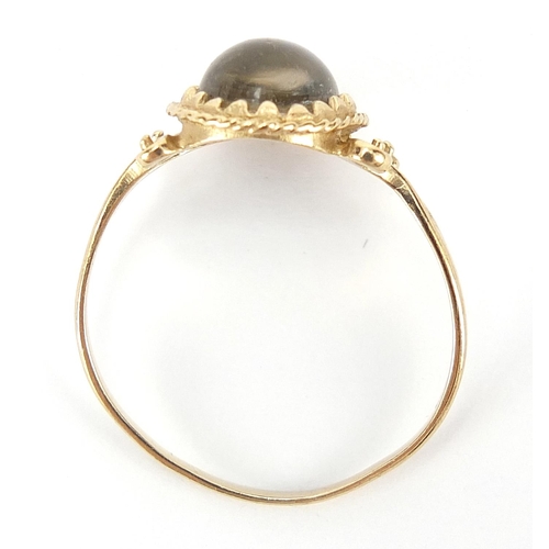 167 - Antique design 9ct gold cabochon stone ring with scrolled shoulders, size R, 1.5g