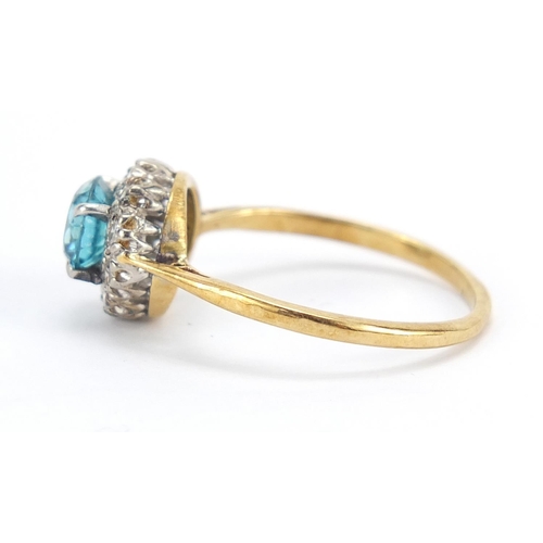 289 - Unmarked gold blue stone and diamond ring, size P, 2.9g