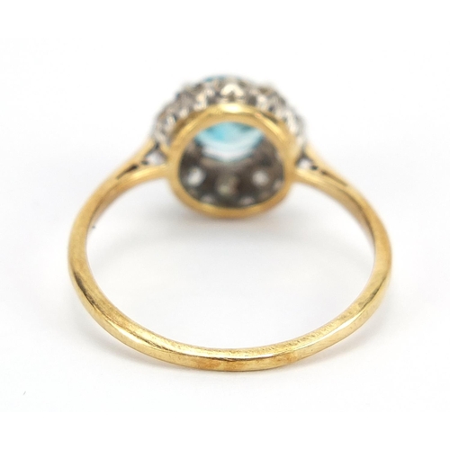 289 - Unmarked gold blue stone and diamond ring, size P, 2.9g