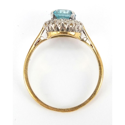 289 - Unmarked gold blue stone and diamond ring, size P, 2.9g