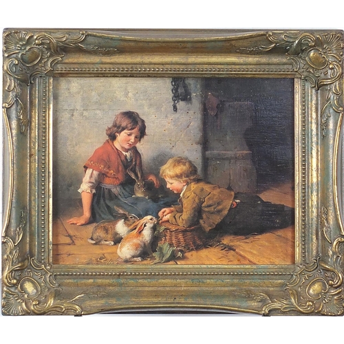 706 - Children and rabbits in an interior, oleograph in colour, mounted and framed, 24cm x 19cm excluding ... 