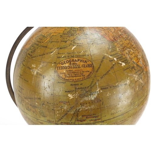 643 - Geographia 8 inch terrestrial table globe with ebonised base, 39cm high