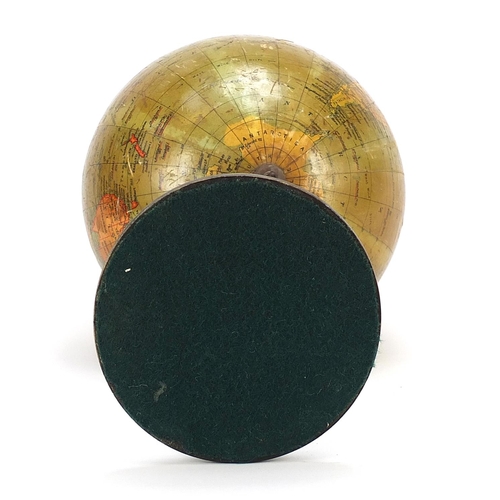 643 - Geographia 8 inch terrestrial table globe with ebonised base, 39cm high