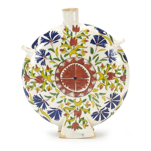 538 - Turkish Kutahya pottery water flask hand painted with flowers, 22cm high