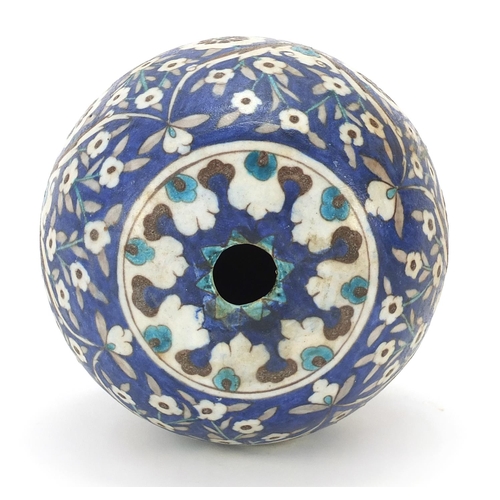 807 - Turkish Kutahya pottery ball pendant hand painted with flowers, 14cm high