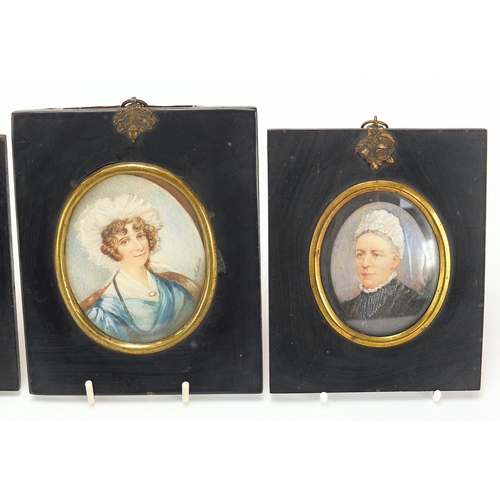 507 - Four Victorian oval hand painted portrait miniatures, including one of a lady wearing a bonnet, one ... 