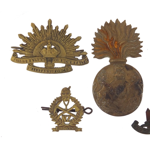 3475 - Five military interest cap badges including Australian Commonwealth Military Forces, 48th Highlander... 