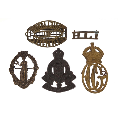 3465 - Five military interest cap badges including Royal Corps of Signals and Royal Army Ordinance Corps