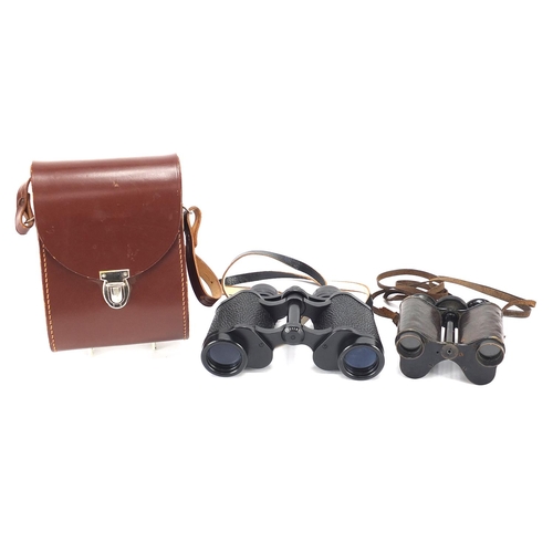 3492 - Two pairs of binoculars comprising Carl Zeiss Jena Jenoptem 8 x 30 with case and a pair of Ross Pris... 