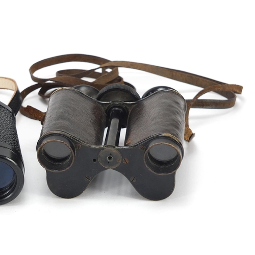 3492 - Two pairs of binoculars comprising Carl Zeiss Jena Jenoptem 8 x 30 with case and a pair of Ross Pris... 