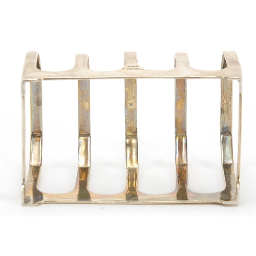 559 - Viners, George VI silver four slice toast rack, Sheffield 1940, 7.7cm wide, 51.6g