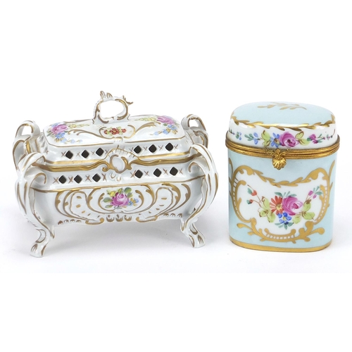 2425 - Limoges porcelain pot and a Continental porcelain box and cover, each hand painted with flowers, the... 