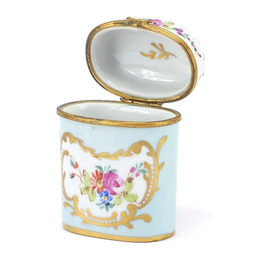 2425 - Limoges porcelain pot and a Continental porcelain box and cover, each hand painted with flowers, the... 