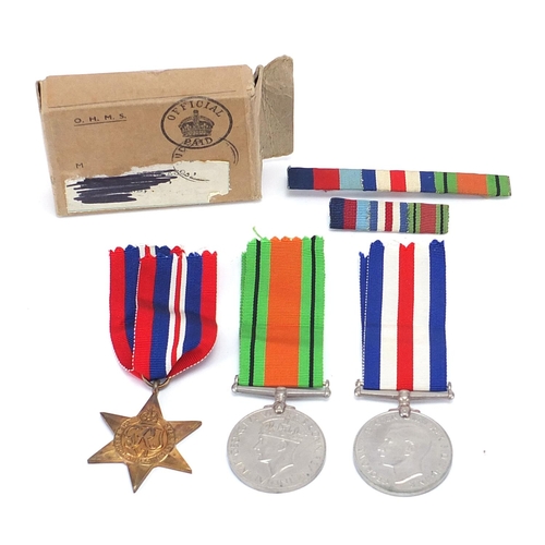 3458 - Three British military World War II medals and a box