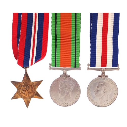 3458 - Three British military World War II medals and a box