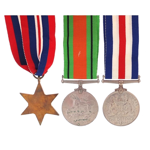 3458 - Three British military World War II medals and a box