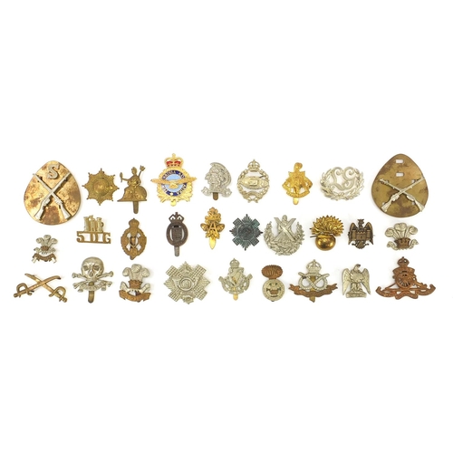 3473 - Military interest cap badges including Waterloo, The Welch and The Royal Sussex Regiment