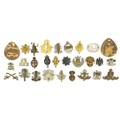 3473 - Military interest cap badges including Waterloo, The Welch and The Royal Sussex Regiment