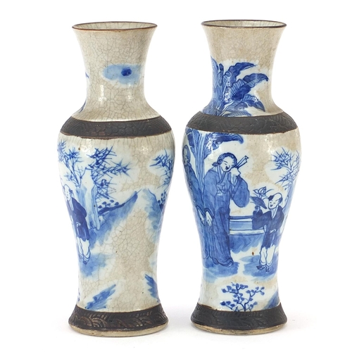 518 - Pair of Chinese blue and white porcelain baluster vases hand painted with figures in a palace settin... 