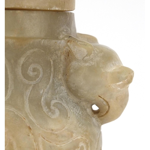 716 - Chinese carved hardstone archaic vase and cover with animalia handles, 21cm high