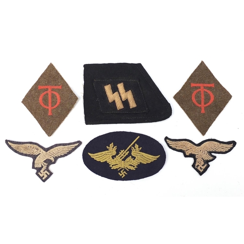 3513 - Six German military interest cloth insignia badges comprising SS Panzer collar fragment, two Luftwaf... 