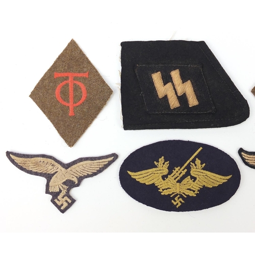 3513 - Six German military interest cloth insignia badges comprising SS Panzer collar fragment, two Luftwaf... 