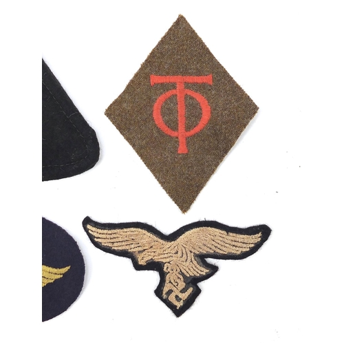 3513 - Six German military interest cloth insignia badges comprising SS Panzer collar fragment, two Luftwaf... 