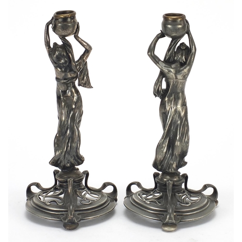 728 - WMF, Pair of German Art Nouveau silver plated maiden design candlesticks, the largest 25.5cm high