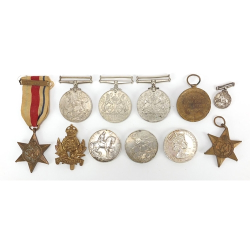 3454 - British militaria including four World War II medals, Intelligence Corps cap badge, Elizabeth II Gen... 