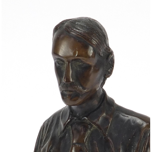 1080 - Early 20th century patinated bronze figure of Robert Louis Stevenson, impressed copyright to the rev... 