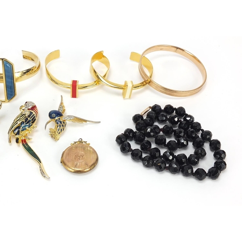 453 - Antique and later jewellery including 1970's bangles, Victorian 9ct front and back locket and jewell... 