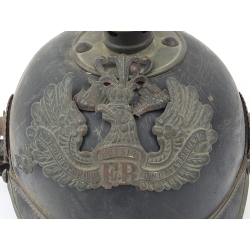 3494 - German military interest Pickelhaube with leather liner, indistinct inscription to the interior