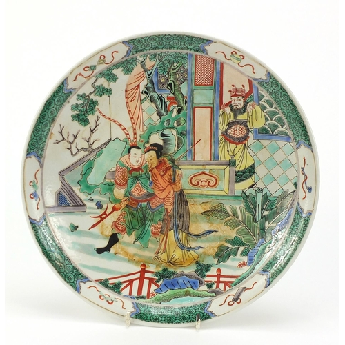 912 - Chinese porcelain plate hand painted in the famille verte palette with warriors in a palace setting,... 