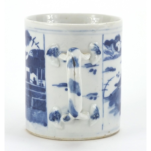 592 - Chinese blue and white porcelain mug hand painted with figures in a landscape, 9.5cm high