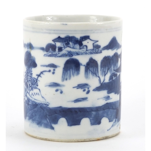 592 - Chinese blue and white porcelain mug hand painted with figures in a landscape, 9.5cm high